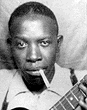 Robert Johnson photo booth self-portrait, early 1930's.  (c) 1986 Delta Haze Corporation  All Rights Reserved.  Used By Permission.